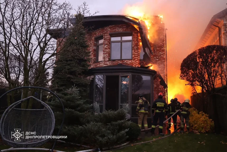 Ukrainian firefighters tackle a blaze after a residence was damaged by a Russian missile attack in Dnipro on Thursday.